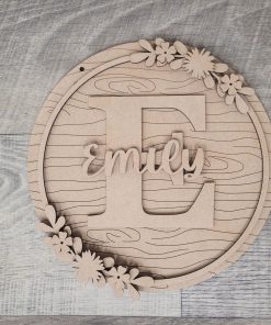 Letter with name on woodgrain round