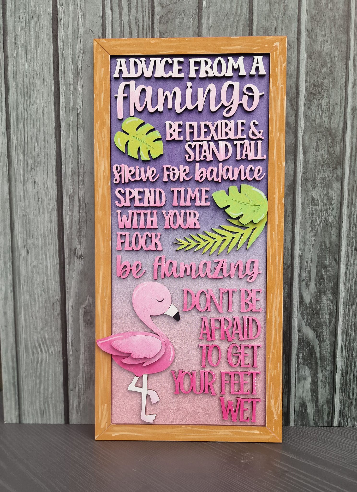 Advice from a flamingo plaque