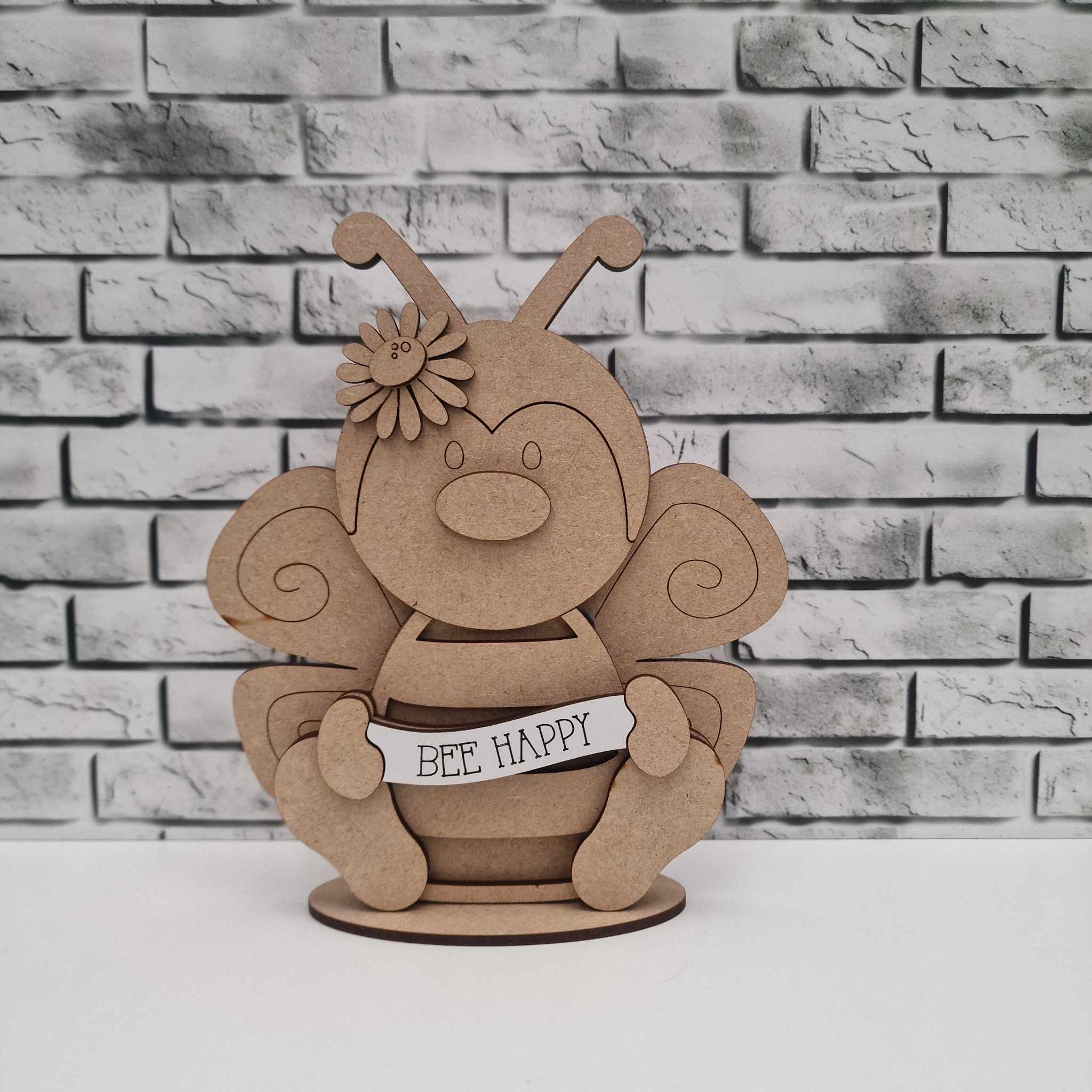 Bee Happy bee on base with banner