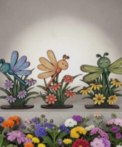 Dragonflies on daisies on bae