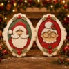 Large Santa and Mrs Claus oval frame