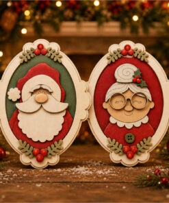 Large Santa and Mrs Claus oval frame
