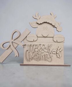 Reindeer in open gift box on base