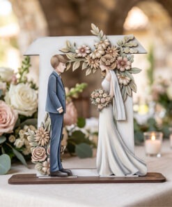 Wedding couple with floral arch