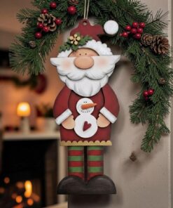 Tall Santa in pjs with snowman 25cm