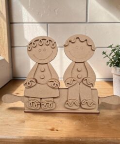 Alternative view of Pair of Gingerbreads sitting on Rolling Pin